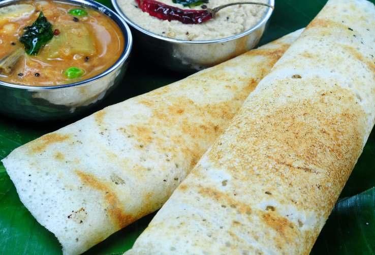DOSA Mix Veg Uthpam $14.90 Rice pancake cooked on hot plate with mix veg topping then served with south indian curried samber, coconut & red chutney Tomato Onion Uthpam $14.