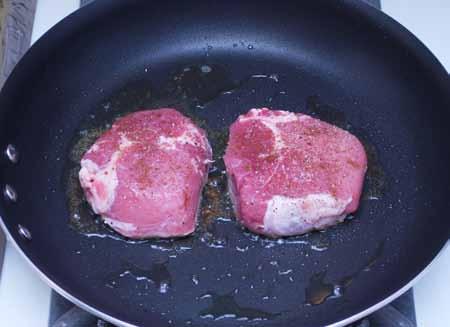 Place the pork chops in the skillet and sauté to an internal temperature of about 135 F (57 C). I provide no cooking time because I prefer always to cook meat by temperature rather than by time.