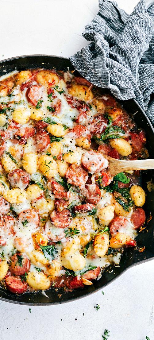 spinach and sausage GNOCCHI WITH SAGE 1 tablespoon olive oil 1 medium onion chopped 2 cloves garlic minced 1 package (13 ounces) Smoked Sausage ½ cup chicken stock 1 can (14.
