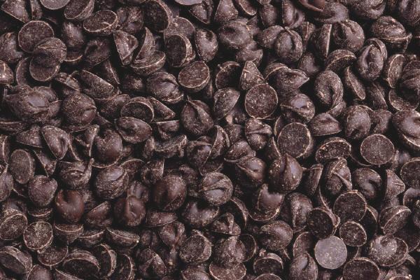 Introduction to Chocolate Production of cocoa and chocolate The cocoa beans are roasted, ground into a paste which is now called cocoa liqueur. This cocoa liqueur contains 50 55% fat, (cocoa butter).