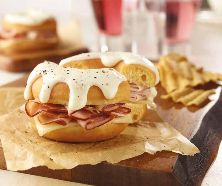 SAVORY DONUT SLIDERS Ready-to-Finish Raised A Yeast Raised Donut Rings Sliced Deli Ham Sliced Swiss Cheese Béchamel Sauce Use ready-to-finish Raised A Yeast Raised Donut Rings to create sweet and