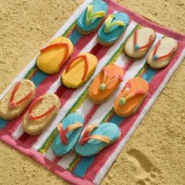 SWEET SANDALS (aka Flip-Flops) -Oval shaped cookies such as Vienna Finger cookies -Frosting -Food Dye -Rope licorice (Multi-Color) 1.