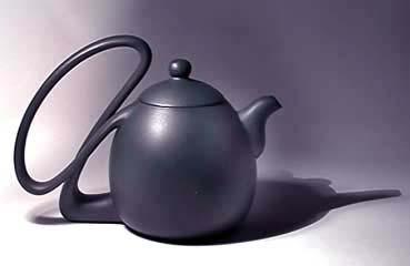 She was able to transform the computer-designed teapot into a real one. Only simple tools were used like a wooden hammer, to beat the clay, a knife and chop sticks. case a teapot was made.