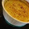 Corn Pudding 1 stick butter, softened 8 ounce sour cream 1 package corn muffin mix 1 15 ounce can niblet corn, thoroughly drained 1 15 ounce can creamed corn 2 eggs Prepare baking dish (loaf pan or