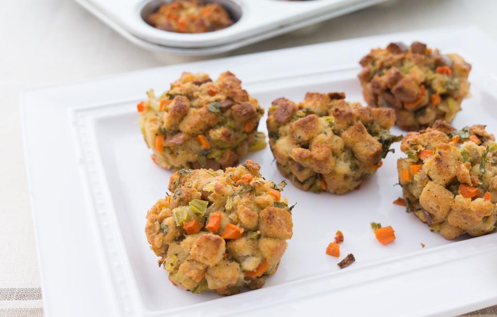 Muffin Pan Stuffing 2 tablespoons butter 1 onion, finely chopped 11/2 cups chopped celery 3 carrots, finely chopped 1/4 cup chopped fresh parsley 4 eggs 1 cup chicken stock (if stuffing is dry, add