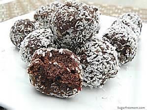 Chocolate Balls (Recipe from Anne) 1 packet (250g) milk arrowroot biscuits ⅓ cup (40g) cocoa powder ½ cup (45g) desiccated coconut (plus a little extra for rolling the balls in) 1 tin (395g)