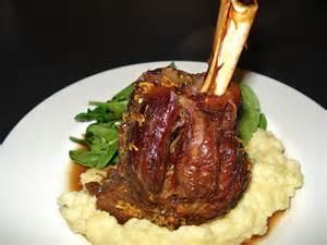 Lamb Shanks (Recipe from Kim in the Purple Skills for Education and Employment Class) 4 lamb shanks 1 cup of plain flour Salt and pepper 1 large onion 2 cloves of garlic Olive oil 3 4 cups of beef