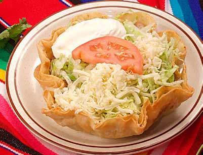 99 Enchiladas Supreme Chicken, bean, cheese and beef enchiladas topped with cheese, lettuce, tomatoes and sour cream 9.99 Our food is not spicy, only if requested.