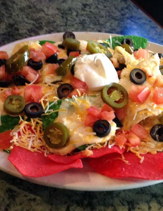 49 Pub Nachos You re going to need a friend to finish this Mountain of Fresh Tortilla Chips Topped with a Special Blend of Cheeses, Olives, Tomatoes, Jalapenos and Sour Cream.