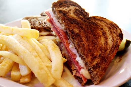 *Reuben ~ It s What We re Famous For! Your choice of Tender Corned Beef or Turkey or Both, topped with Sauerkraut and Swiss Cheese. Served on toasted Marbled Rye Bread.
