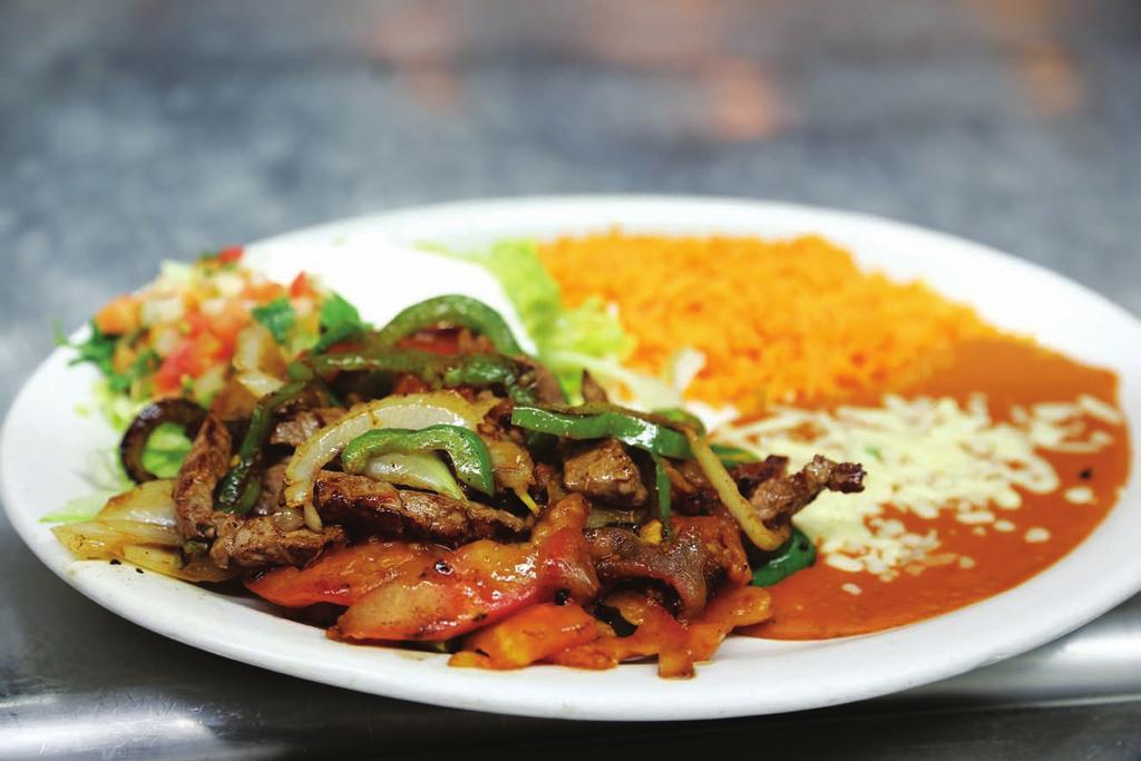 FAJITAS FAJITAS DINNER Grilled steak or chicken with onions, tomatoes and bell peppers. Served with guacamole salad, sour cream, rice and beans and tortillas. MIXED FAJITAS.