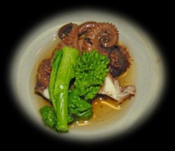 飯蛸旨煮 (Yi-dako umani) Yi-dako, simmered in a tasty soup with boiled rape blossoms.