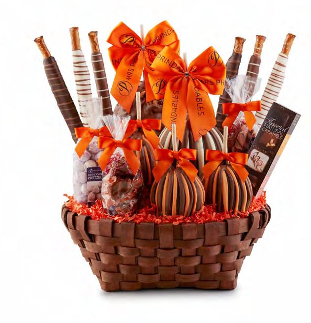 #1939007 $79.99 Premium Halloween Caramel Apple Gift Basket A basket brimming with premium autumn indulgences.