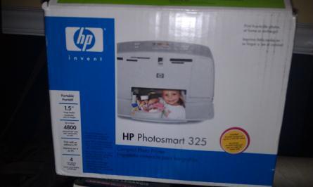 Gift Baskets/Products 5 HP Photosmart 325 4 x 6 Photo printer Compact photo printer. Print all those summer vacation photos with ease!
