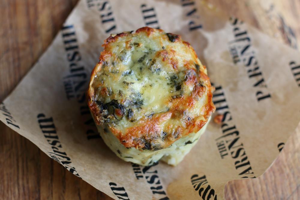 Stilton & Spinach Potato Cake Vegetarian & Gluten Free Serving Suggestions: Bake them in or out of the wraps and serve them with greens: purple sprouting and lemon butter.