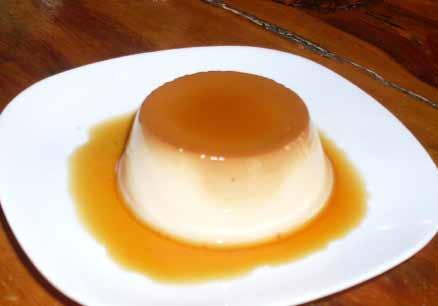 Desserts Flan Fried Ice Cream A fried tortilla shaped into a bowl and filled with a scoop of vanilla ice cream.