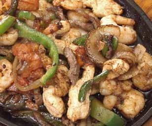 Texas Fajitas Pollo Feliz Pollo Tropical Pollo al Fogón Chihuahua Special Texas Fajitas Tender-sliced steak, chicken and shrimp grilled with bell peppers, onions and tomatoes.