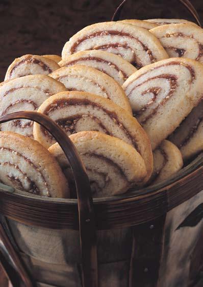 almond jelly swirls Fruit jelly spirals through these sugar cookies, to eye-catching effect.