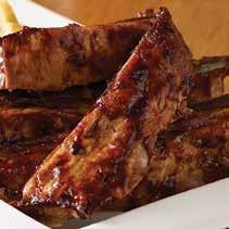 95 Our famous pork, lamb & beef ribs smothered in Bourbon sauce, with a side of chicken wings in your choice of mild, medium or ass burner sauce. OUTBACK CHOOK Chicken Schnitzel..$22.