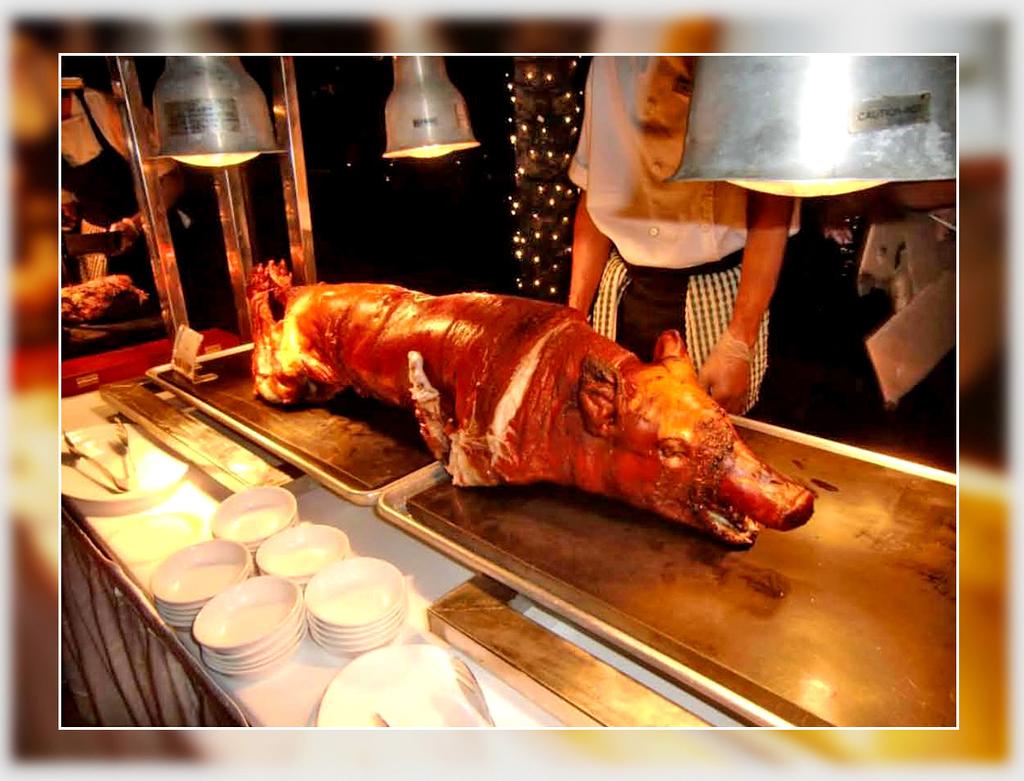 B5 ROASTED PIG : a roasted whole pig, or piglet seasoned in spices, cooked in charcoal No celebration could be complete without serving the famous lechon.