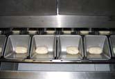 A variation of the system is the proofer with swinging cups, suitable to work only round shaped doughs.