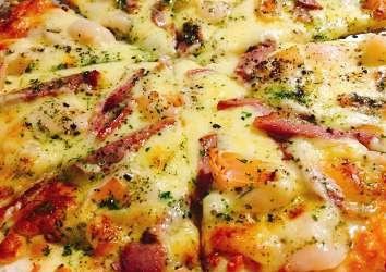 PIZZA Meat lovers pizza $19.90 Chicken salami, ham, bacon, sausage, sunny side up, mozzarella, parmesan & cheddar Seafood pizza $21.