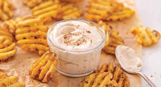 Wahoo! Fries & Dipping Sauce 1 (27 ounce) package frozen waffle fries 1 tablespoon Wahoo! Chili Seasoning, divided ½ cup sour cream 1.
