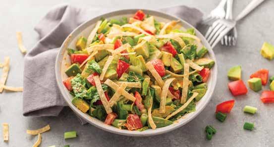 Mexican Chopped Salad ½ cup creamy ranch dressing 1 tablespoon Mom s Favorite Taco Seasoning 18 ounces chopped Romaine lettuce 1 large tomato, chopped 1 ripe avocado, pitted, peeled and chopped ¼ cup