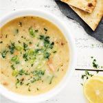Homemade chicken, lemon and egg soup, served with house-baked pita