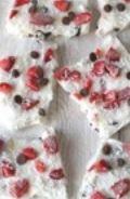 Frozen Yogurt Bark Snack time just got exciting with this recipe for energy boosting Frozen Yogurt Bark: greek yogurt sweetened with honey and topped with chocolate chips, strawberries and coconut
