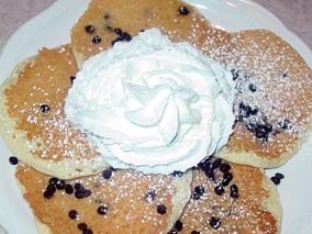 TRADITIONAL PANCAKES BUTTERMILK PANCAKES 6.99 Pure and simple, topped with powdered sugar. SILVER DOLLARS 6.99 A stack of 10 miniature pancakes, sprinkled with powdered sugar.