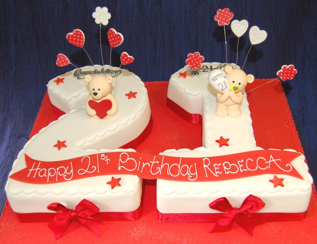 sponge 79 Both figures rich fruit 99 Set on a 14 x18 iced cake board Available