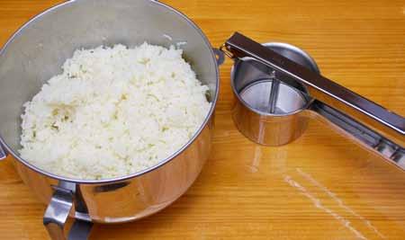 17 10 Mash the potatoes. I use a potato ricer for perfectly smooth mashed potatoes.