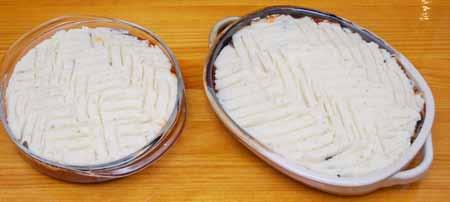 20 Spread mashed potatoes over the eggplant and decorate the top with a pattern using a