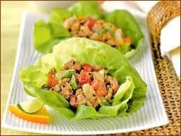 T hai Lettuce Cups 2 skinless, boneless chicken breasts, cut into strips 1 tablespoon extra- virgin olive oil 1 red bell pepper, cut into strips ¼ chili sauce 2 tablespoons honey 1 head iceberg