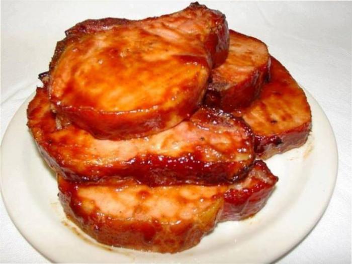 10 thick pork chops (always allow one per person) 12 ounces ketchup (about half a bottle) 1-1/2 cups water 1/2 cup sugar 1/2 cup vinegar Salt and pepper to taste 1 small