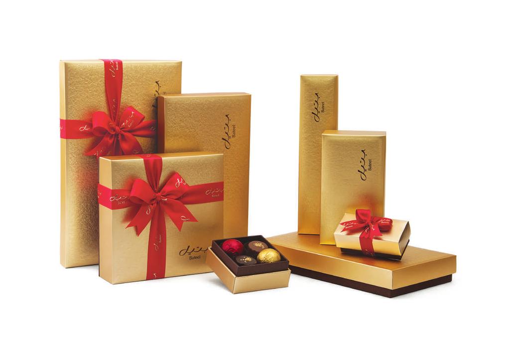 CASSANDRA GOLD Simple and elegant Bateel signature boxes with dark brown base and textured light gold lid 4-PIECE RECTANGLE SMALL LARGE CONTENTS P23625143 P23625137 P23625138 P23625139