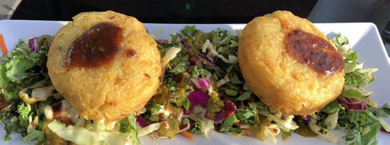 ................ 6 two masala spiced potato cakes served on a bed of d^licious salad SAMOSA CHOLE CHAAT.