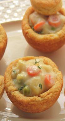 VEGETABLE POT PIES Prep time: 25 minutes Total time: 45 minutes Non-stick baking spray 18 refrigerated biscuits or homemade 6 tablespoons butter 1 cup diced yellow onions 1 cup quartered button