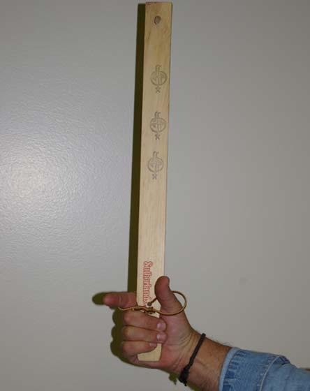 Spur or hook on the atlatl. To hold the atlatl, place it in your hand with the spur facing upward.