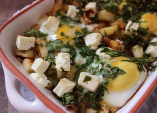 Feta egg bake 2 medium sized sweet potatoes, peeled and diced 100g white onion, diced salt and pepper to season 1 tbsp coconut oil or butter plus extra for greasing 4 medium sized eggs small handful