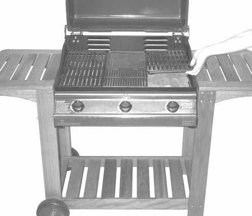 Lay the cooking grill(s) (B1) and griddle (B2) into place.