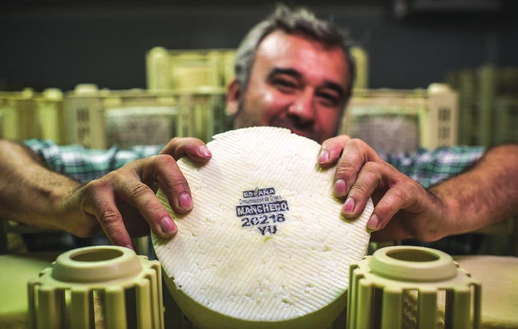 Parra s enthusiasm is infectious, and as we watch cheesemakers Flor Vasilie and Andrea Raica press fresh curds into traditional Manchego cheese molds, he encourages us to scoop handfuls of this