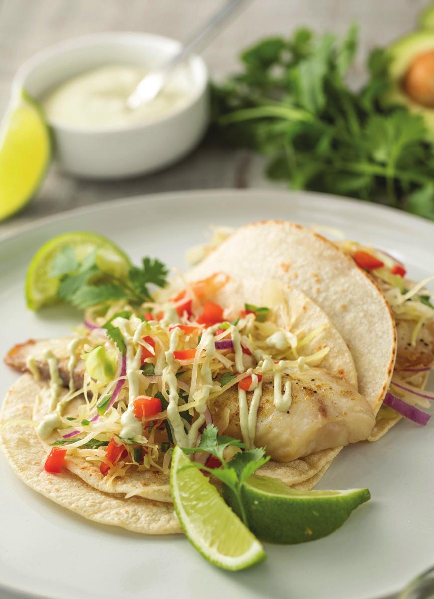 DINNER 12 FISH TACOS WITH CABBAGE SLAW AND AVOCADO CREMA SERVES 2 1 ripe avocado 1 cup sour cream 2 tablespoons + 2 teaspoons freshly squeezed lime juice, divided 1 teaspoon ground cumin, divided
