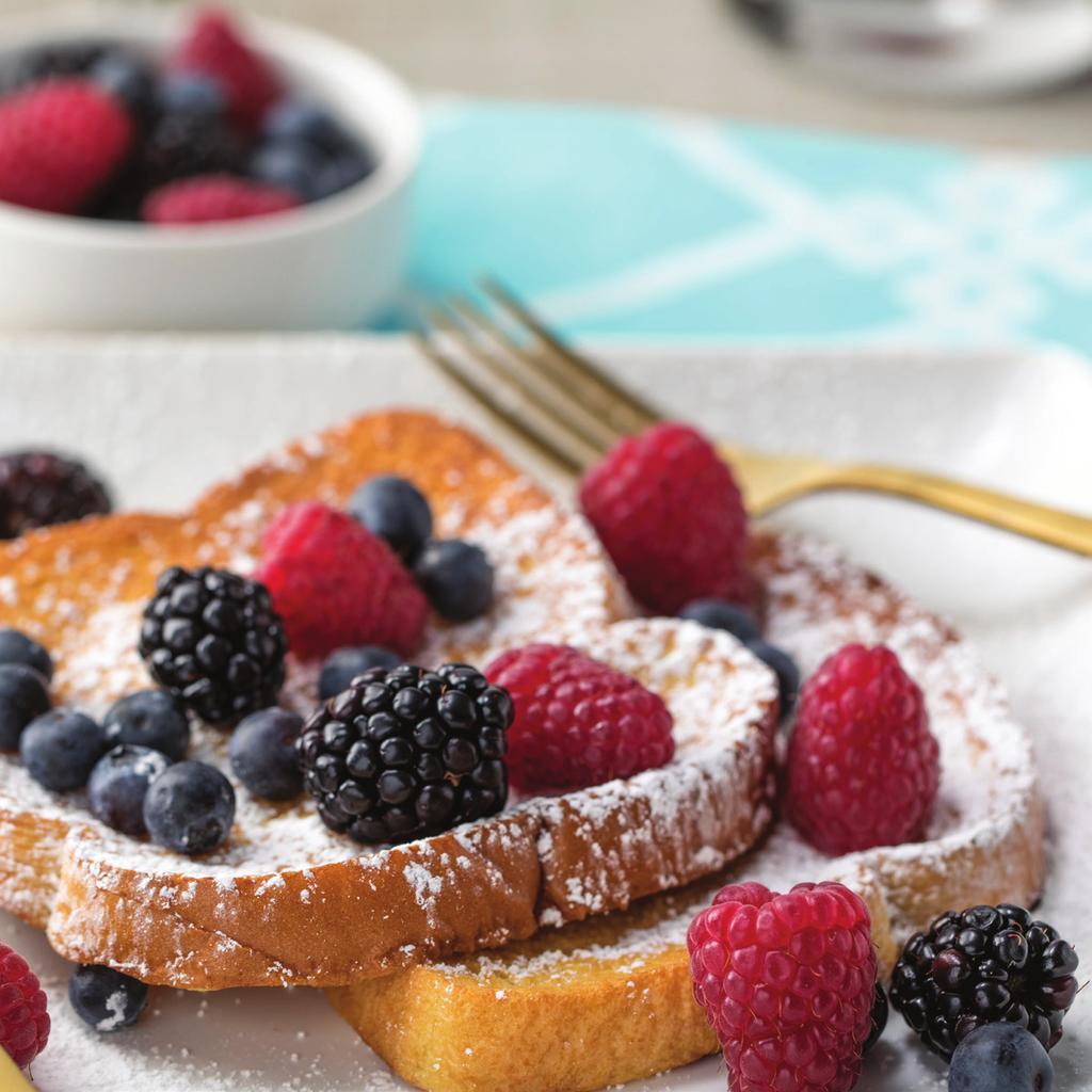 6 FRENCH TOAST WITH FRESH BERRIES SERVES 2 4 large eggs 1/2 cup whole or 2% milk 4 slices white bread Nonstick cooking spray, for the pan 1/2 cup powdered