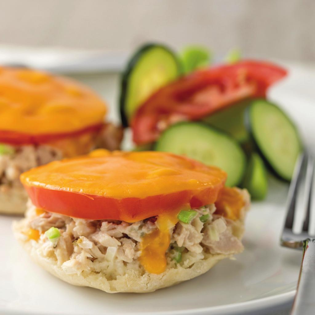 9 TUNA MELT SERVES 2 2 cans (5-ounce) solid white tuna, drained and flaked 1/4 cup thinly sliced celery (about 1 rib) 1 tablespoon finely diced yellow onion 1 tablespoon