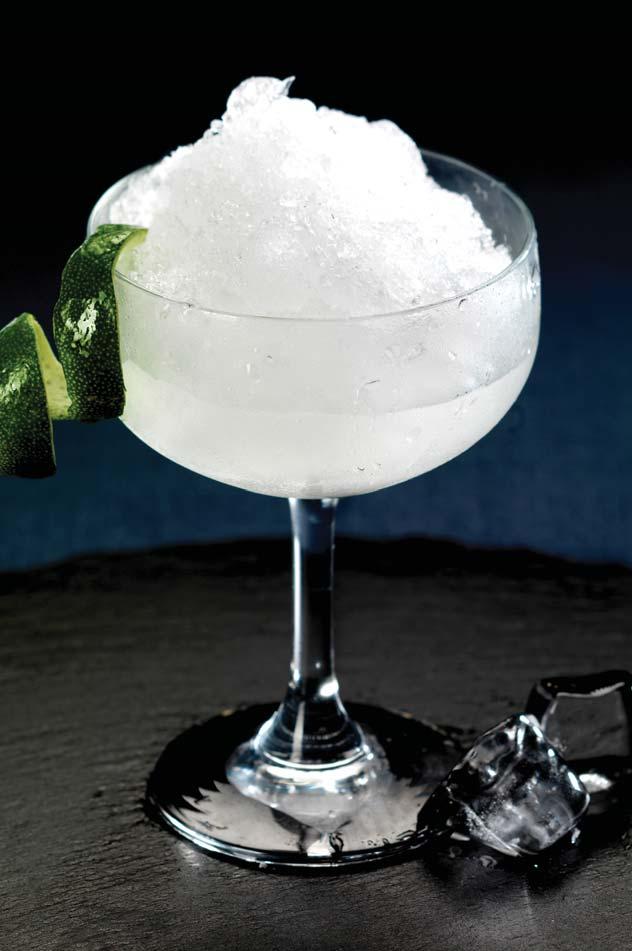 Cocktail07 Frozen Daiquiri Ernest Hemingway s favorite drink the Frozen Daiquiri. 1 Peel the lime. 2 Add the lime. 3 Add some rum, triple sec, syrup and stir well. 4 Serve it with ice.