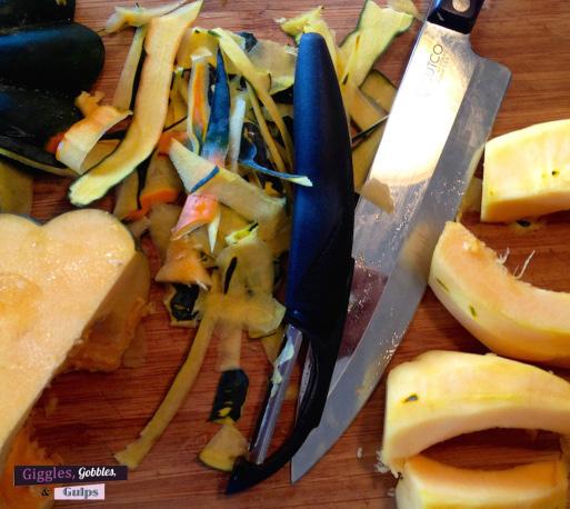 Cut the squash lengthwise and use a spoon or ice cream scoop to remove the seeds.