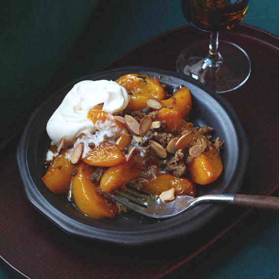 Peach Gingersnap Crisp G R A C E P A R I S I 4 tablespoons unsalted butter 6 large peaches (2 1/2 pounds), peeled and cut into 1/2-inch wedges 1/4 cup plus 2 tablespoons light brown sugar 2