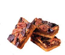 caramel, piled high with brownie cubes, toasted pecans & drizzled with milk chocolate ganache.